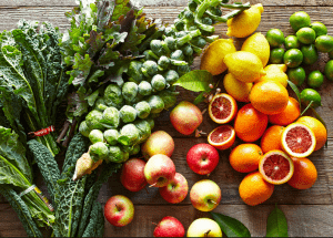 a group of fruits and vegetables on a wood surface Healthy Weight Loss Diets Wednesbury